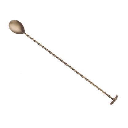 An Antique Gold finished Barfly Bar Spoon with Muddler on a white background