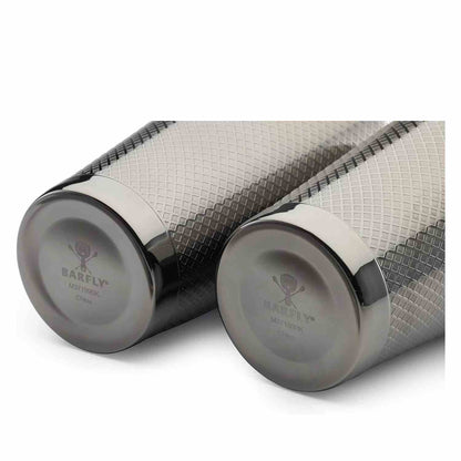 A close-up of the Barfly Gun Metal Black colored diamond lattice shaker cocktail tin set of 18 oz and 28 oz on a white background