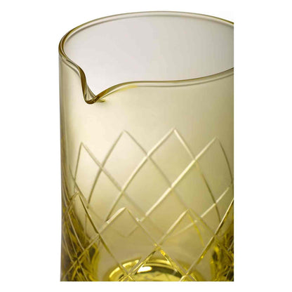 A close-up of the Gold Barfly Mixing Glass 17oz (500 ml) with geometric patterns on a white background