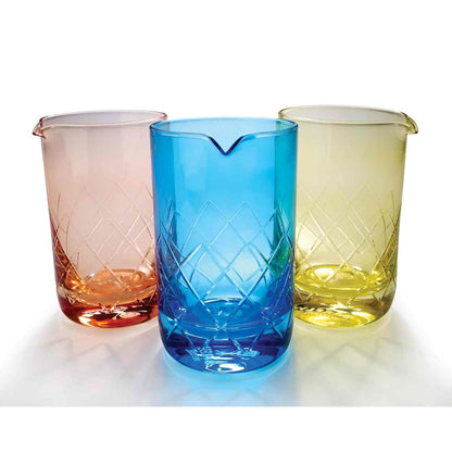 A Gold Barfly Mixing Glass 17oz (500 ml) with b;ue and yellow glasses on a white background