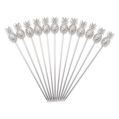 A set of 12 of the 4.5 inch Stainless Steel Barfly Cocktail Pick, with a Pineapple on the end on a white background.